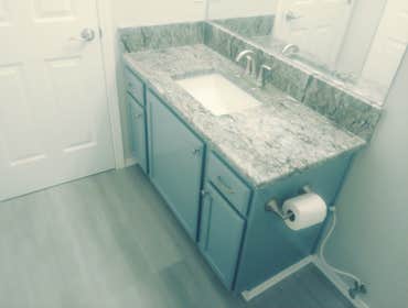 Photos by Expression Stone Construction #5 Guess bathroom update new texture,new trim,Sherwin Williams paint on ceiling,wall and vanity cabinet,granite