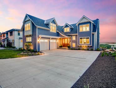 Sunset Ridge Nestled along the pristine shores of Lake Michigan, this coastal home embodies the epitome of luxury and tranquility. In addition, this st