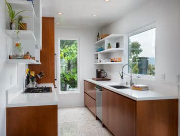Palmer Ave , Glendale CA Mid-century modern kitchens are characterized by their clean lines, sleek surfaces, and minimalist aesthetic. Cabinetry: slab-