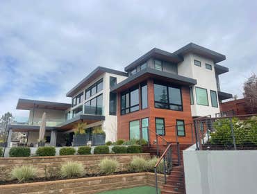 Photos by Outermost Constuction Technologies LLC #1 We delivered a modern, energy-efficient, no-maintenance façade solution with ACM panels, durable me
