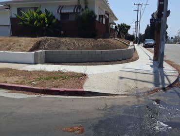 Photos by Garco Concrete Pro #2 Retaining Wall with compacted backfill and drainage
