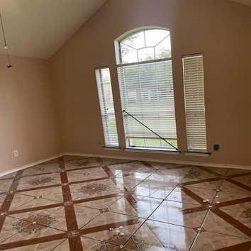 Rowlett, Texas Demo 1000 sq ft of carpet and vinyl plank floor and installation of 1000 sq ft of ceramic tile. Painted interior walls. Design and insta