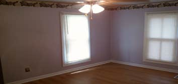 Project: Painted, new wood flooring, wallpaper border added.