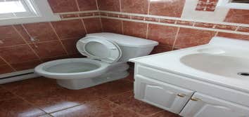 Photos by Tdv Construction #1 Lay ceramic tile flooring and tile tub surround