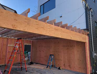 Photos by A-Windy City Garage Corporation #5 New garage construction attached with flat roof.