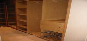 LAM Woodworks Here are some pictures of work done using different materials, from stained Mahogany to solid Bubinga or Beech, from Maple to Poplar for