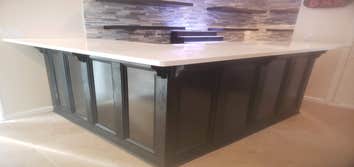 Photos by Newlook Finishing Contracting & Handyman Services #2 bar /Entertainment area