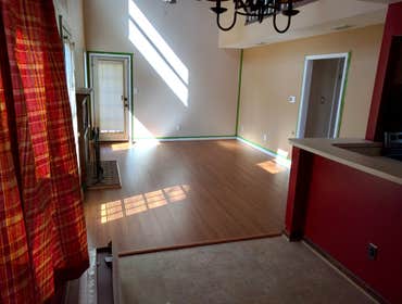 Capstone Crossing Laminate Installed a beautiful 12mm Laminate after taking up the ceramic tile and carpet in the downstairs of this nice Virginia Beac