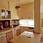 Iris Classic Kitchen Classic Kitchen With modern touch, tile floor at kitchen and living room, old style tile as backsplash, etc.