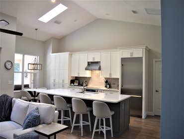 Still Forest Kitchen Kitchen update, removed walls from closing in the kitchen. Updated flooring thru out the home.