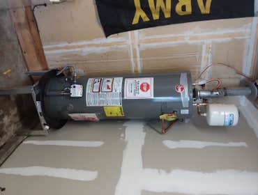 Photos by Sims Solutions, LLC #2 Water heater install, before seismic straps and inspection.