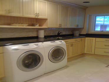 Photo(s) from North Shore Closets & Cabinetry Inc. Laundry Room Cabinetry