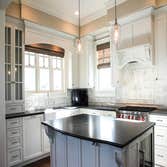 Baine Contracting Inc Project Multiple jobsites - showing kitchens, interior and exterior trim work, new homes, bathrooms, tile work, wood and iron ra