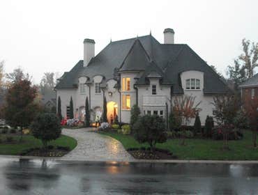 McClure Manor Normandy French design. 7,000 Sq/ft of details. Theater room, and formal dining w/groin ceilings. Free standing walnut spiral stair case 