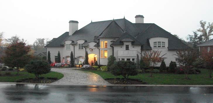 McClure Manor Normandy French design. 7,000 Sq/ft of details. Theater room, and formal dining w/groin ceilings. Free standing walnut spiral stair case 