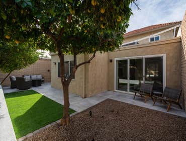 Villa San Marcos Landscape Expanded patio concrete pad and front entry steps. New tile on entry and patio. New landscape lighting, irrigation in front 