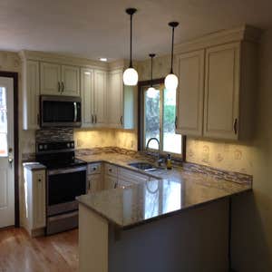 Granville Kitchen This wonderful couple in Granville, MA hired us to install some beautiful Wallpaper and Mosaic Tile they obtained in their...