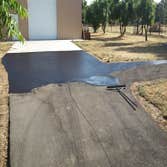Apshalt Driveway Sealcoat This asphalt was allowed to cure for 1 year prior to sealcoating.