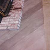 Grey maple under brick