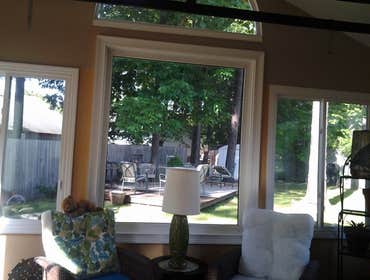 sun room 16x16 concrete slab with 8" lap siding.