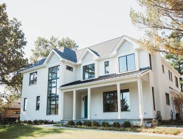 Oakbrook Home Remodel Believe it or not this was a full remodel of an existing 2,500 sq. ft. ranch home with red brick. We added a 2nd story, vaulted k