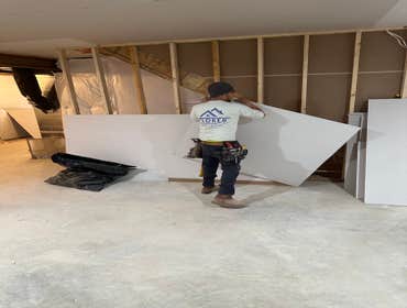 Photos by Flores Home Improvement LLC #1 Roof replacement paint wainscoting installation frame and drywall installation