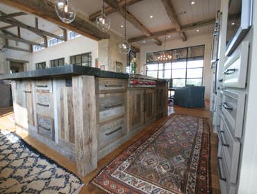 Rustic Chic Kitchen This transitional, yet rustic chic, kitchen was designed and built for this client using both new and old materials. The massive i
