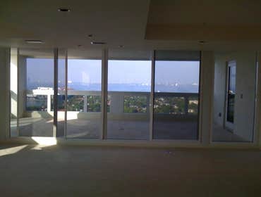 Water Proof Owners Suite/Grand Beach Hotel Waterproofing and tile on exterior balcony