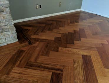 Custom herringbone hardwood floor installation, Brazilian Cherry wood