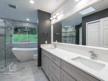 Primary Bathroom Remodeling in Carnation Full primary bathroom remodel including demolition of existing finishes and fixtures. Installation of a custom