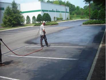 Sealcoating Sealcoating by traditional paving
