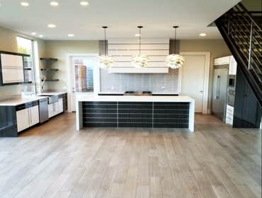 Photos by Oak & Stone Inc #3 New hardwood flooring, counter tops and backsplash tile.