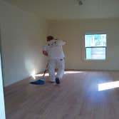 Laminate Floors Client requested old carpet to be removed and laminate floors installed.