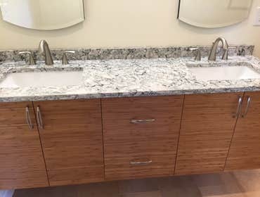 Master Bathroom, Ewing, New Jersey This bathroom features a five foot shower, heated floors, custom window awning and off the floor Kohler Toilet. The
