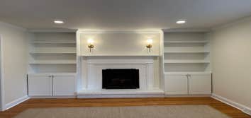 Photos by General remodeling #2 Family Room remodel. We installed two custom built in base cabinets with custom shelves. We installed new crown molding