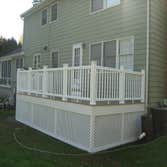 Project photos from Shaun P Hamilton Kitchen remodle in cherry, With Bilevel island. 20 X 30 Composite deck project complete. Interior trim project in 
