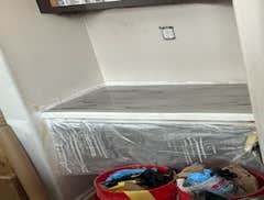 Photos by On-It LLC #1 Cover existing laminate countertop with a epoxy for a marbleled look.