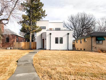 Curves are Good The only part of the home that remained on this extensive demo and addition was the front facade, which inspired a curved staircase and