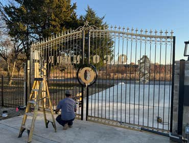 Photos by Art Construction #3 Custom hand-crafted luxury gate installation. This premium driveway gate was meticulously fabricated by hand, featuring o