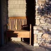 Cambria Stone Entry Arts and Crafts style inspired design. The pilaster lighting is custom designed and fabricated to achieve the correct proportion an