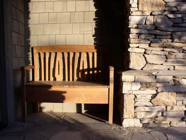 Cambria Stone Entry Arts and Crafts style inspired design. The pilaster lighting is custom designed and fabricated to achieve the correct proportion an