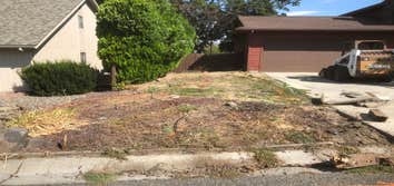 Photos by Houston Construction LLC #1 Excavation of area 8” down, developed a retaining wall , trucked in 21 tons of gravel to make a extra parking are