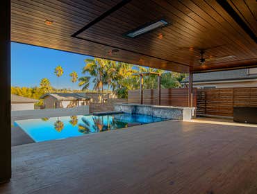 Encinitas, CA Remove all existing structures, landscaping and clear lot. Build a New Custom Home, Pool, Outdoor Living Area and ADU. Home includes Uppe