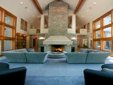 Vacation Beach Residence This Vacation Beach Home located in the center of a 5 acre site near Lake Michigan was designed with a contemporary but minima
