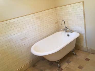 Full bathroom remodel -remove plastic shower enclosure -Install New “Vintage” style tub