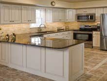 Kitchen Cabinet Refacing View our project portfolio to see our high-quality kitchen cabinet refacing restorations.