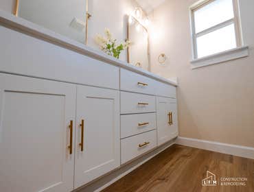 Cozy Modern Bathroom Warm tones, plush textures, and contemporary fixtures create an inviting oasis that’s both chic and relaxing. Discover how thought