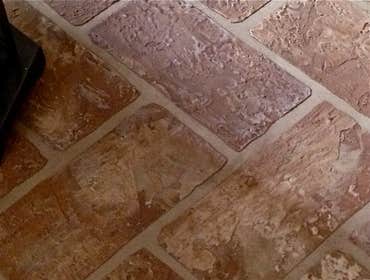 A concrete overlay of a brick