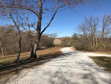 Photos by Hyperion Construction Inc #8 Clear the land next the lane and the regrade the area so that the water no longer rushed down the lane and washe