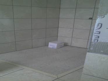 Wheelchair Accessible Custom Shower This project was a challenge because we had a very tight budget yet had to stick to strict specifications. Through
